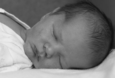 Newborn sleeping on back | Adelaide Gentle Sleep Consultant | Elemental Beginnings